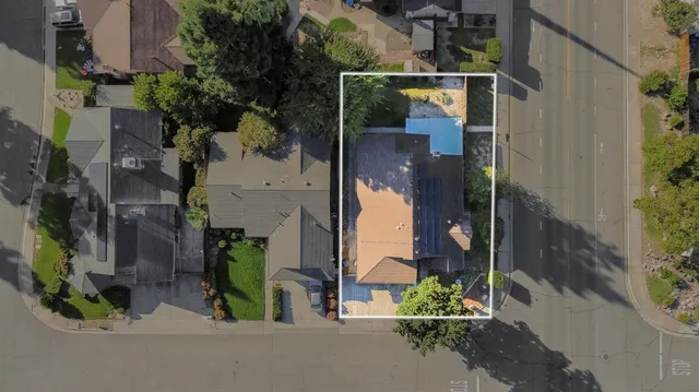 an aerial view of houses with deck