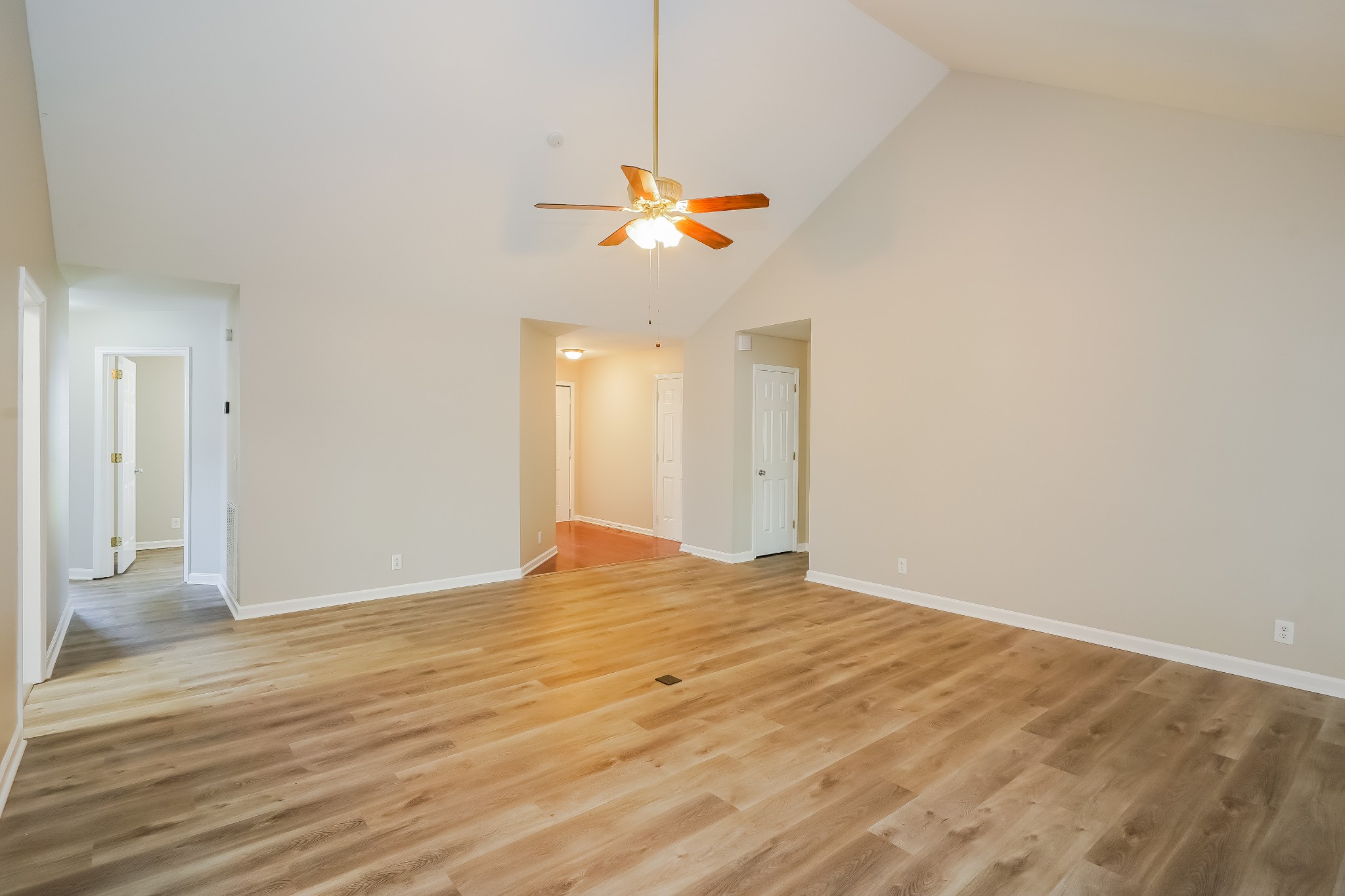 1204 Curran Court Antioch, TN 37013 - Photo 3 of 16 a view of empty room with wooden floor and fan