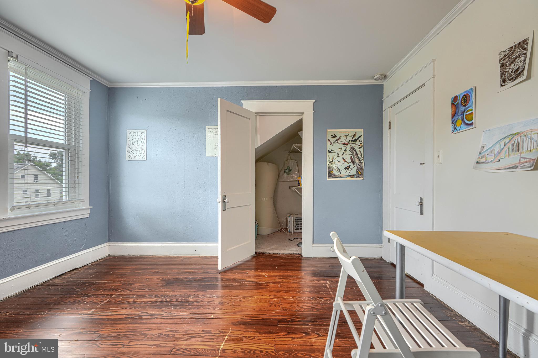 2705 Latona Road Baltimore, MD 21214 - Photo 33 of 53 a view of a livingroom with furniture and wooden floor