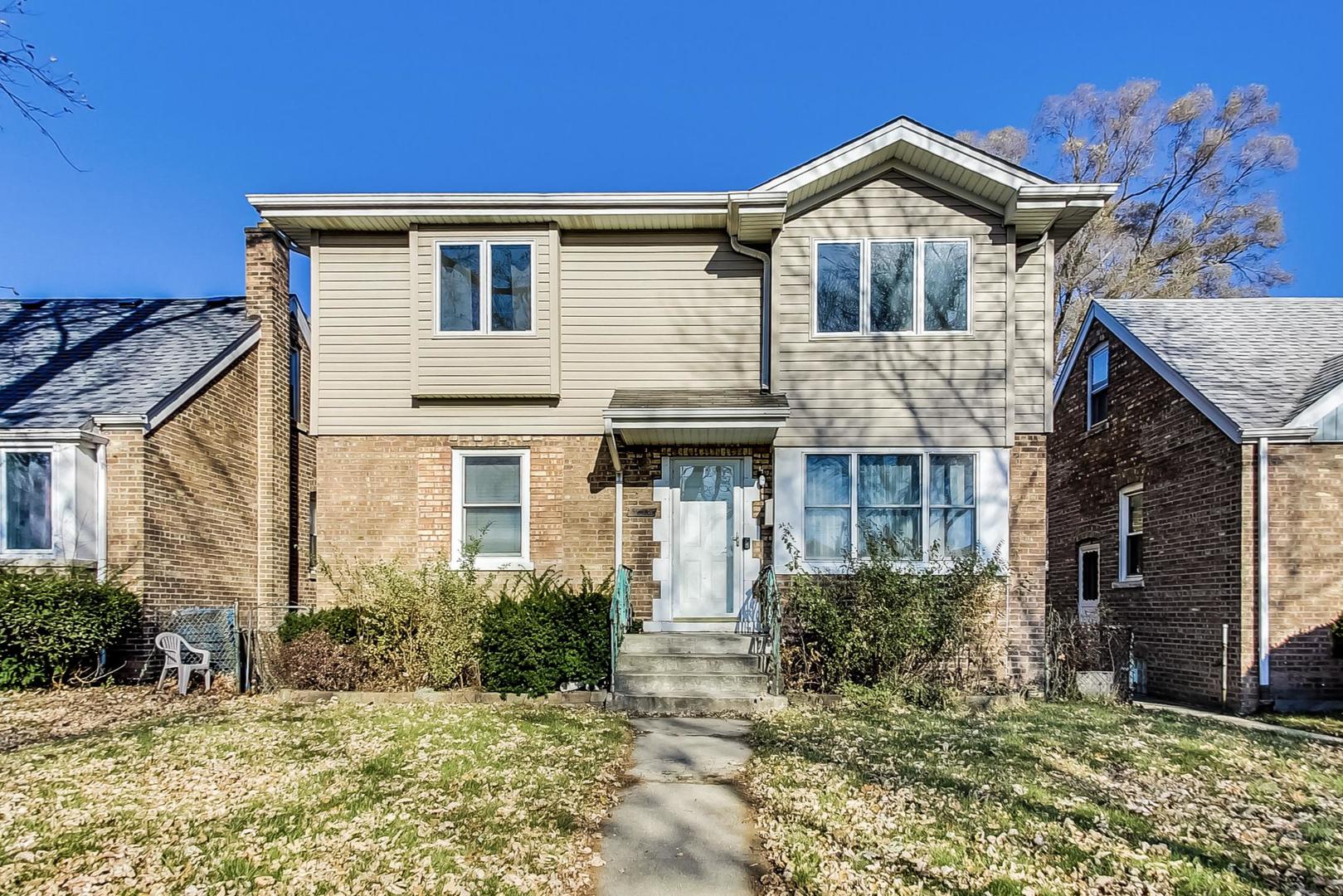3616 West 116th Street Chicago, IL 60655 - Photo 1 of 33 a front view of a house with a yard