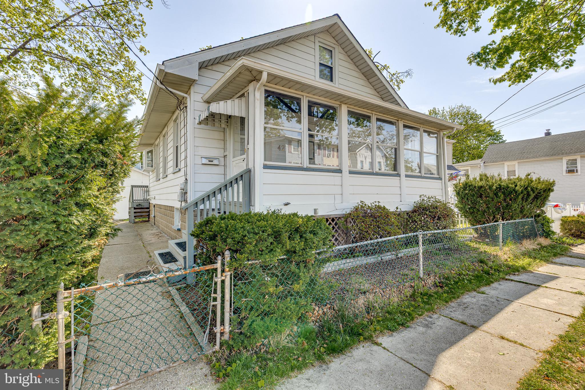 427 Buttonwood Street Delanco, NJ 08075 - Photo 2 of 37 a front view of a house with plants