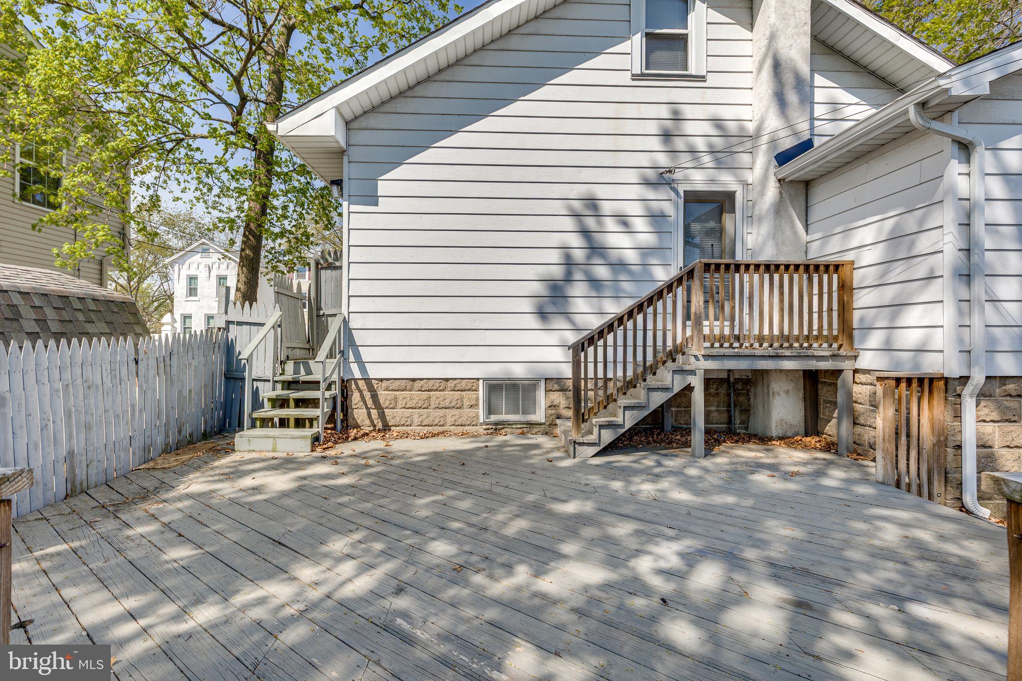 427 Buttonwood Street Delanco, NJ 08075 - Photo 35 of 37 a view of a house with a roof deck