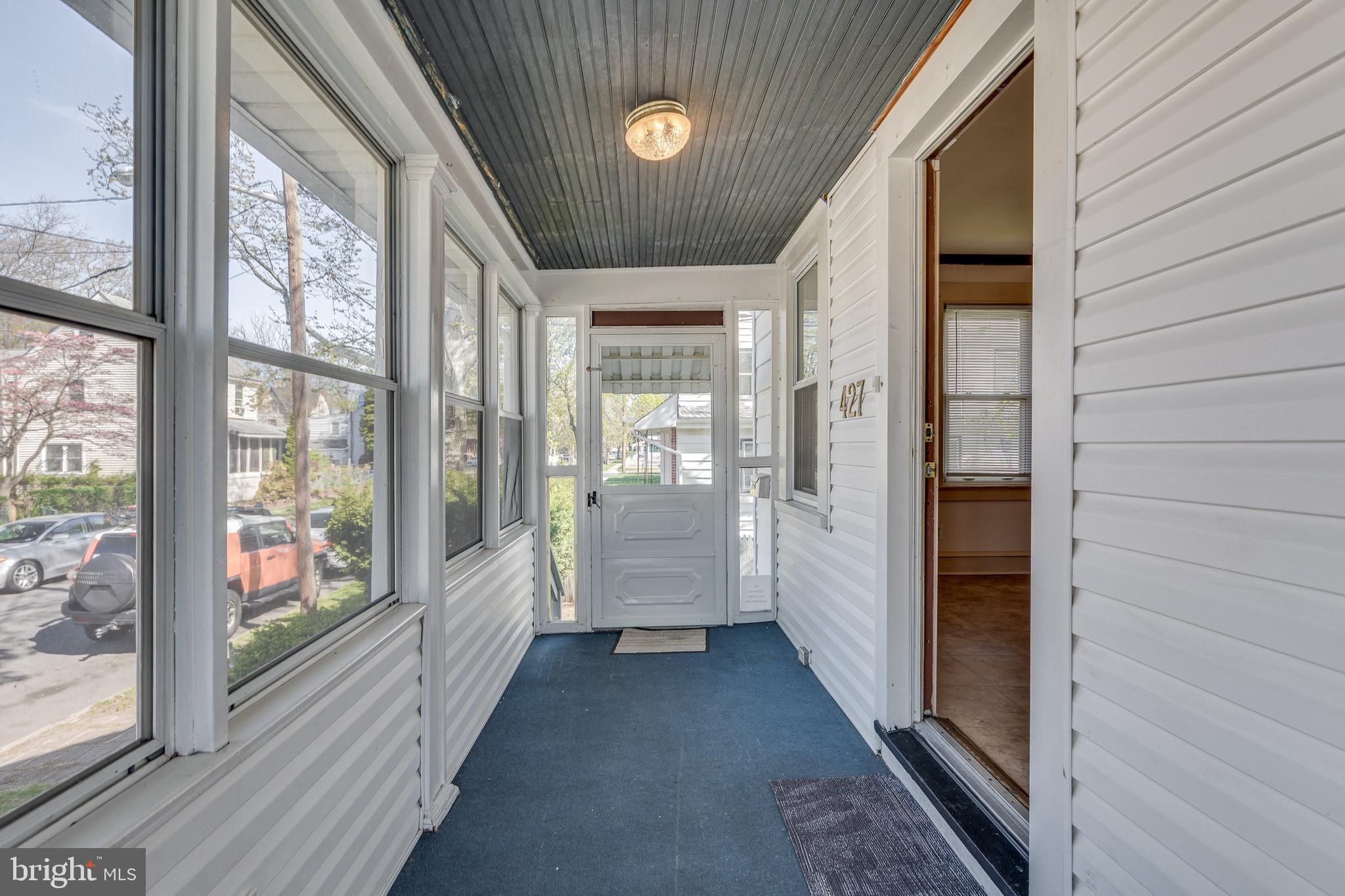 427 Buttonwood Street Delanco, NJ 08075 - Photo 6 of 37 a view of a hallway with windows