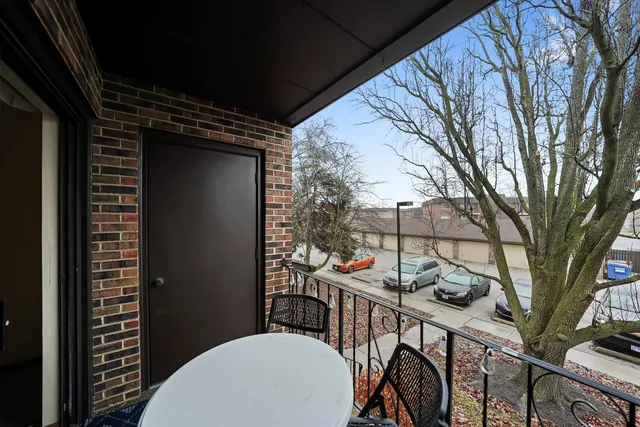 a view of a balcony dining area