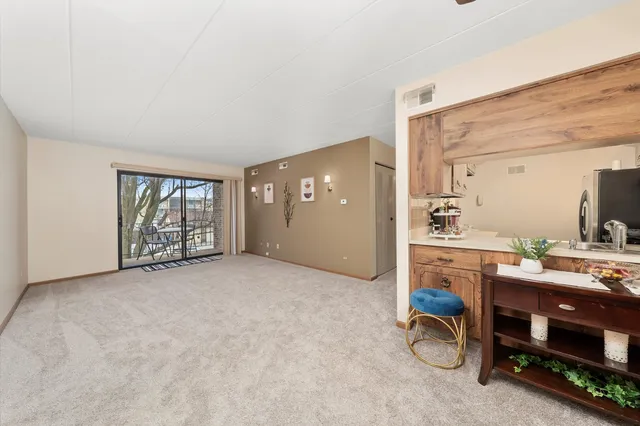 a view of livingroom with furniture and windows