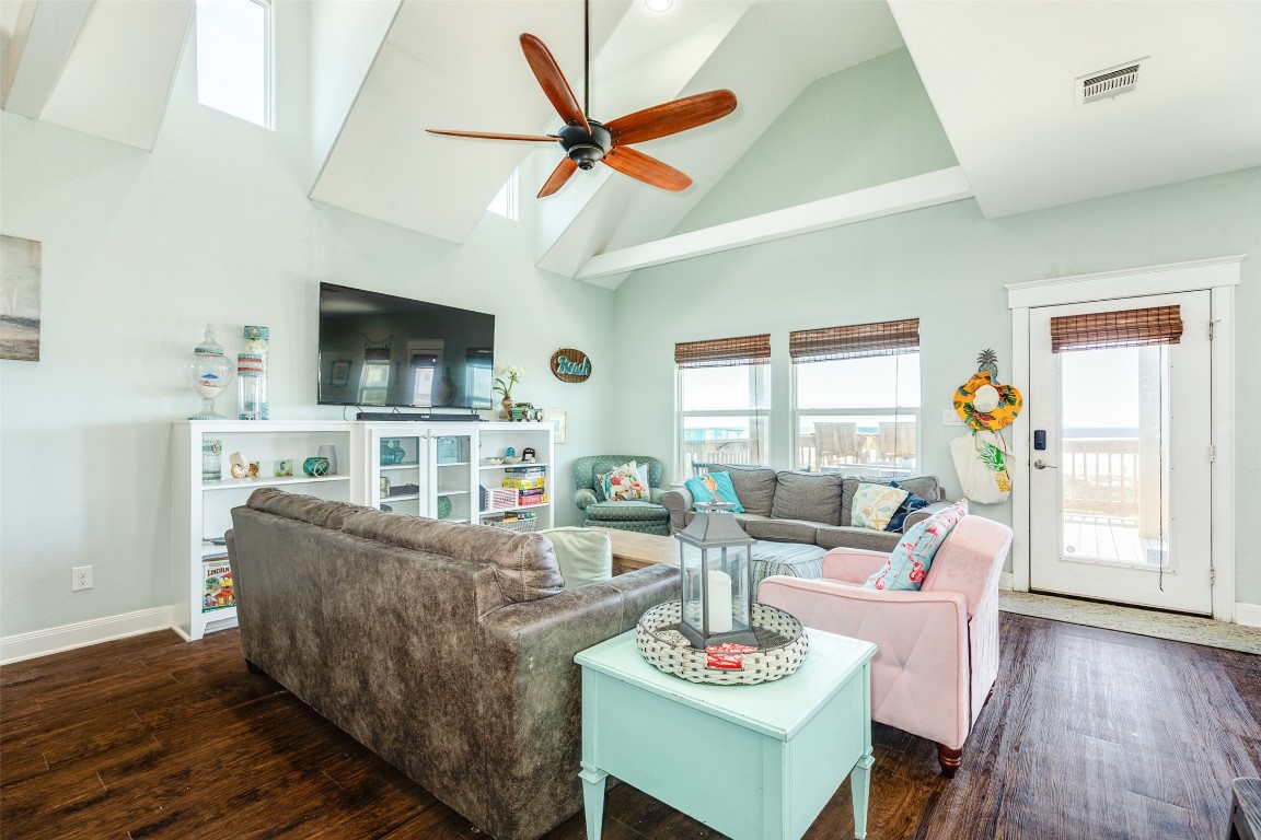 510 Point Lookout Surfside Beach, TX 77541 - Photo 11 of 41 a living room with furniture a flat screen tv and a window