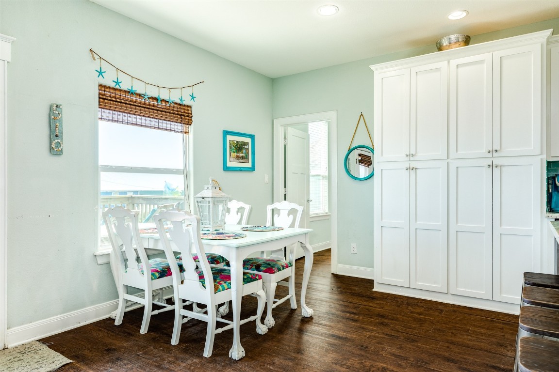 510 Point Lookout Surfside Beach, TX 77541 - Photo 13 of 41 a view of a dining room with furniture and wooden floor