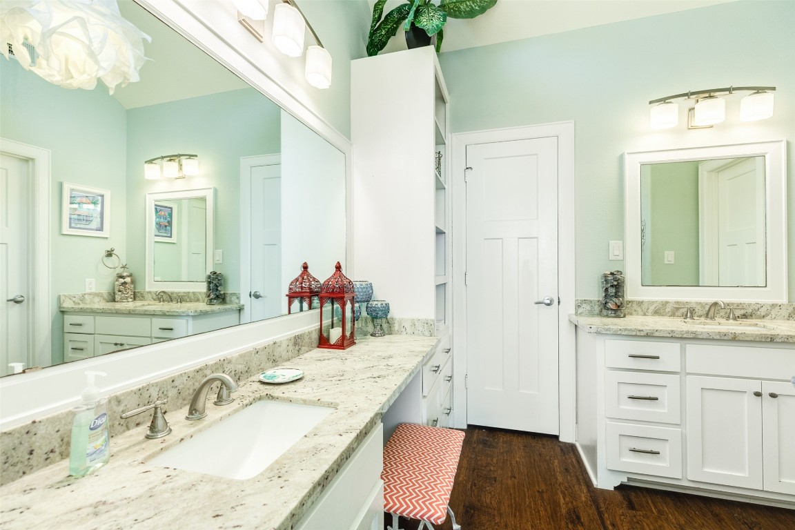 510 Point Lookout Surfside Beach, TX 77541 - Photo 16 of 41 a bathroom with a granite countertop double vanity sink and a mirror