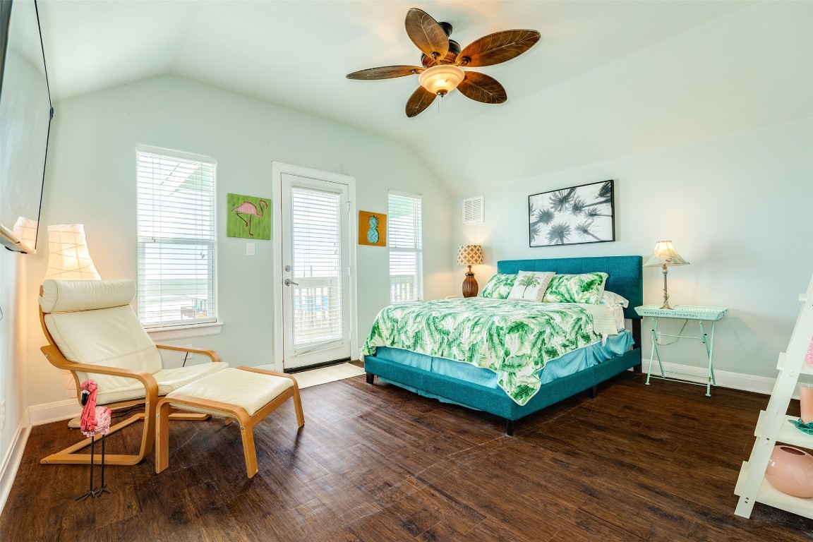 510 Point Lookout Surfside Beach, TX 77541 - Photo 24 of 41 a bedroom with a bed window and a chair