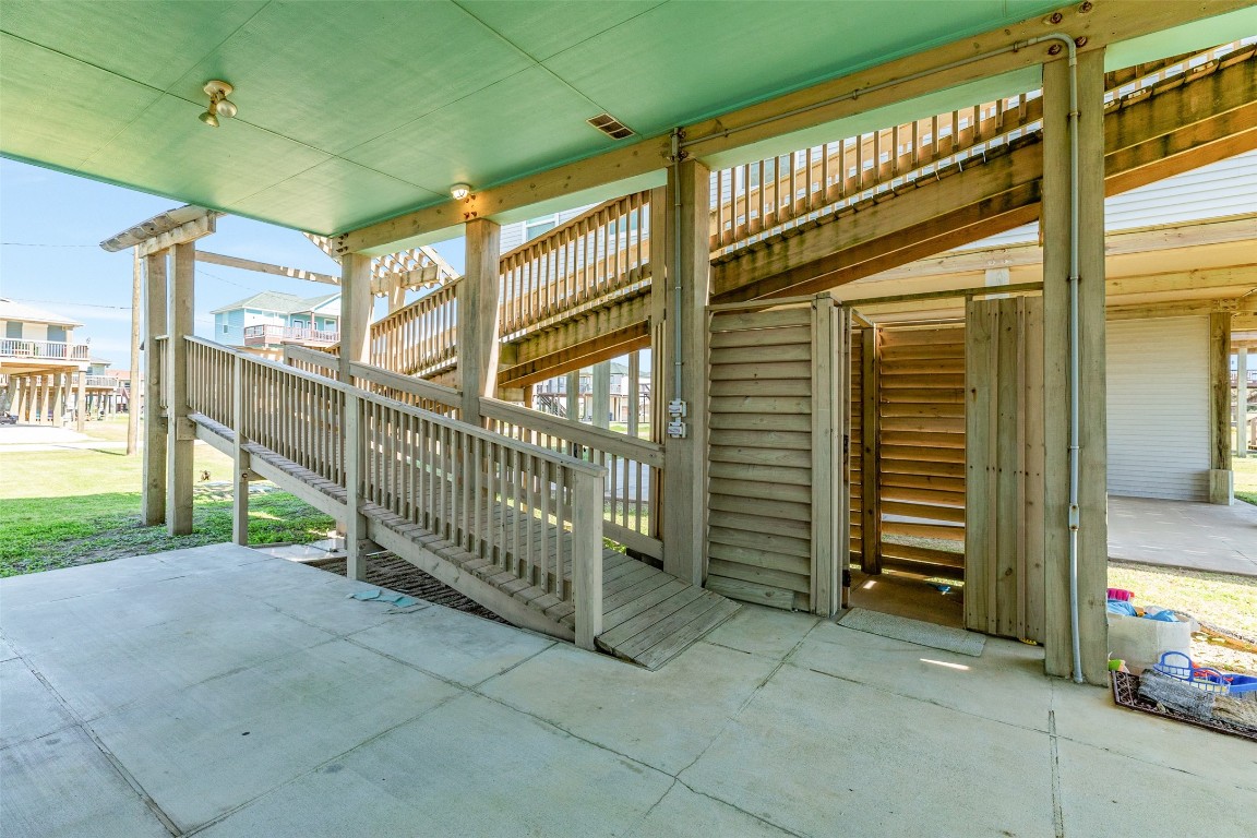 510 Point Lookout Surfside Beach, TX 77541 - Photo 32 of 41 a view of a porch with a table and chairs