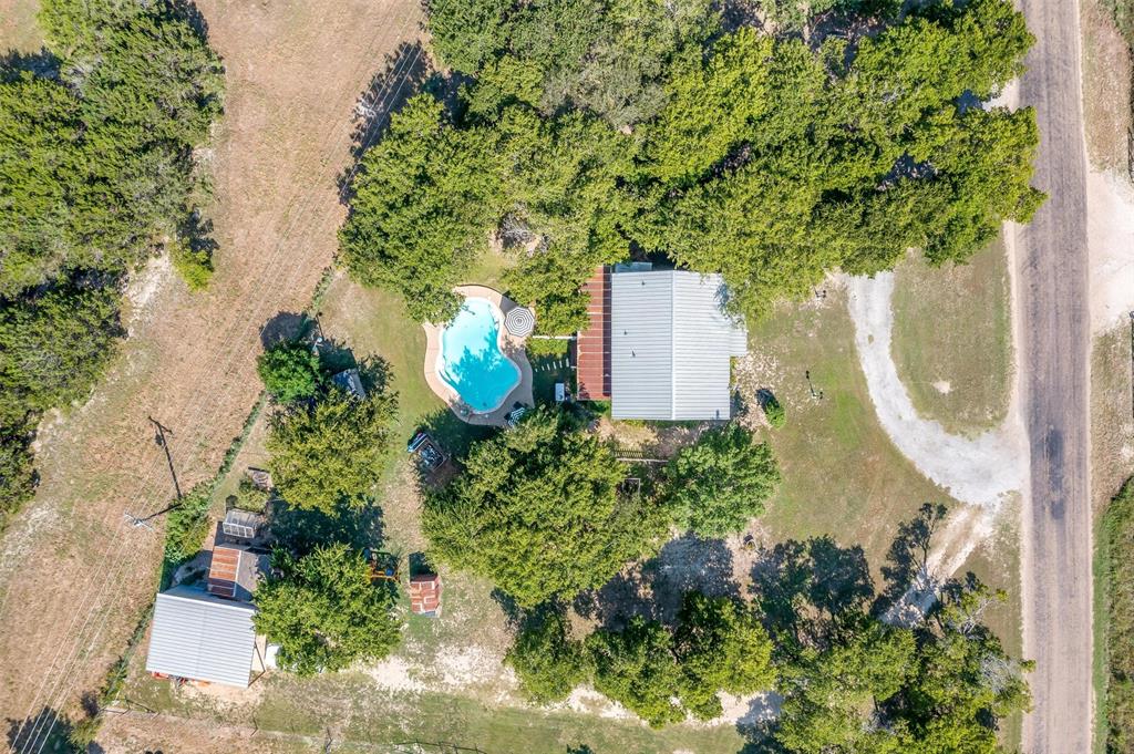 8716 County Road 1224A Rio Vista, TX 76093 - Photo 8 of 38 Bird's eye view of a pool area