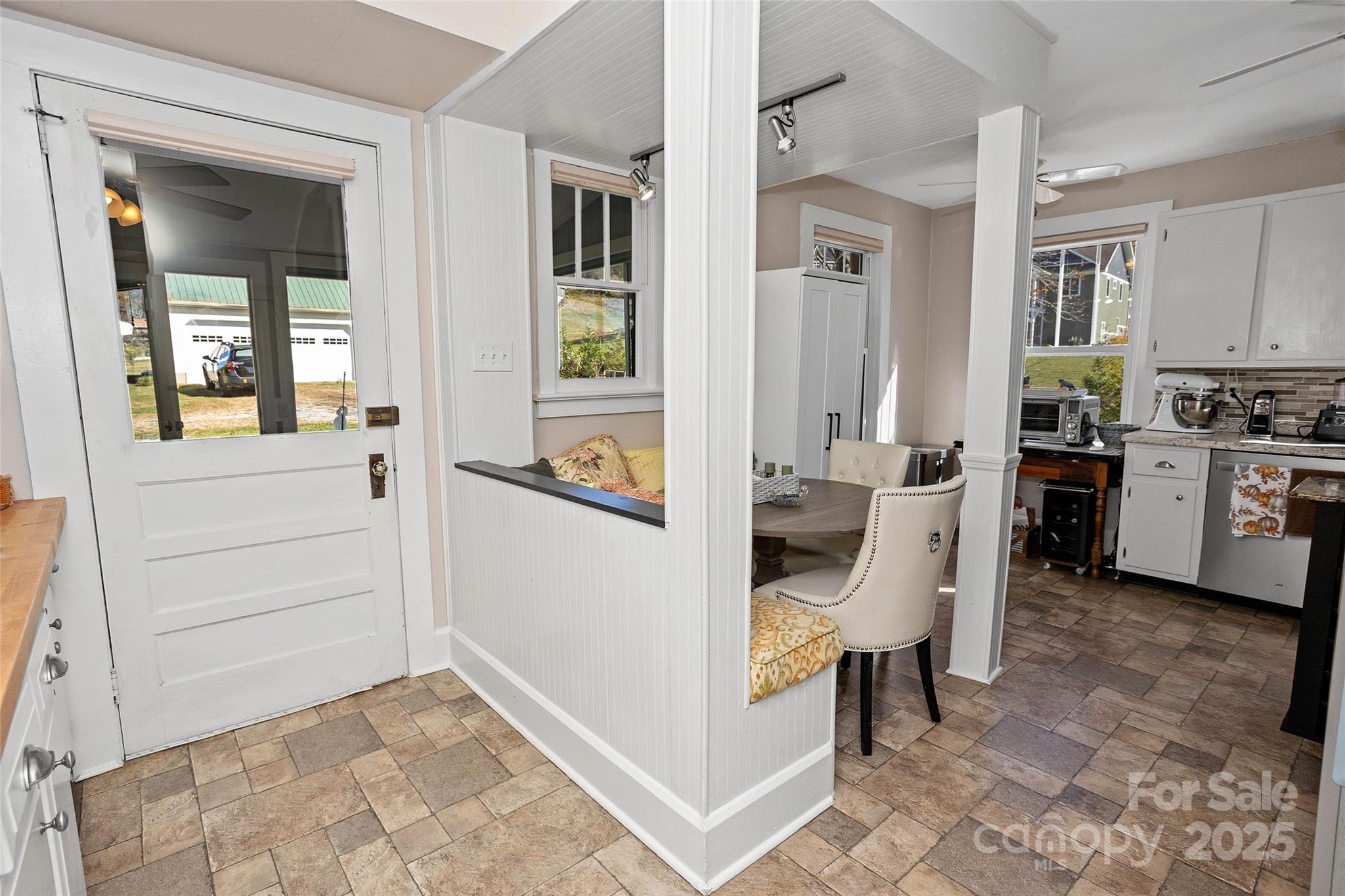 3471 Chimney Rock Road Hendersonville, NC 28792 - Photo 13 of 48 a view of a hallway and a livingroom with furniture