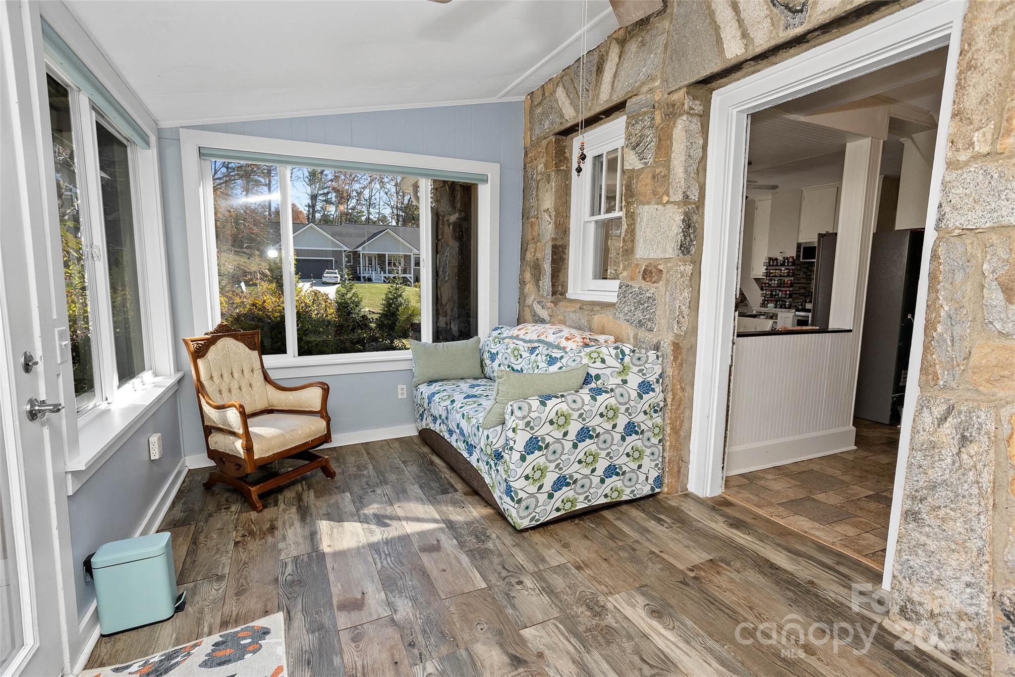 3471 Chimney Rock Road Hendersonville, NC 28792 - Photo 15 of 48 a living room with furniture and a large window