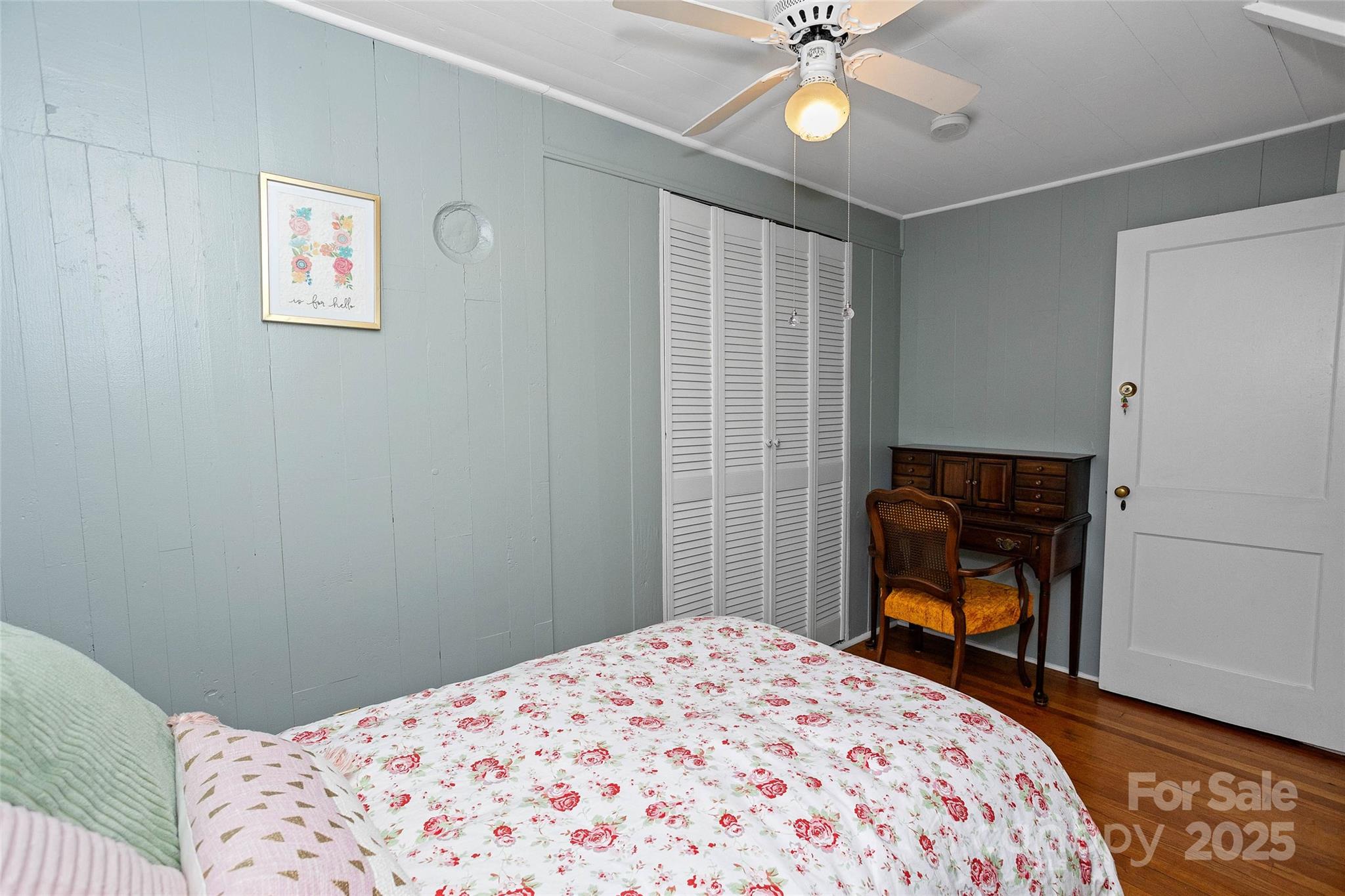 3471 Chimney Rock Road Hendersonville, NC 28792 - Photo 20 of 48 a bedroom with a bed and a chandelier
