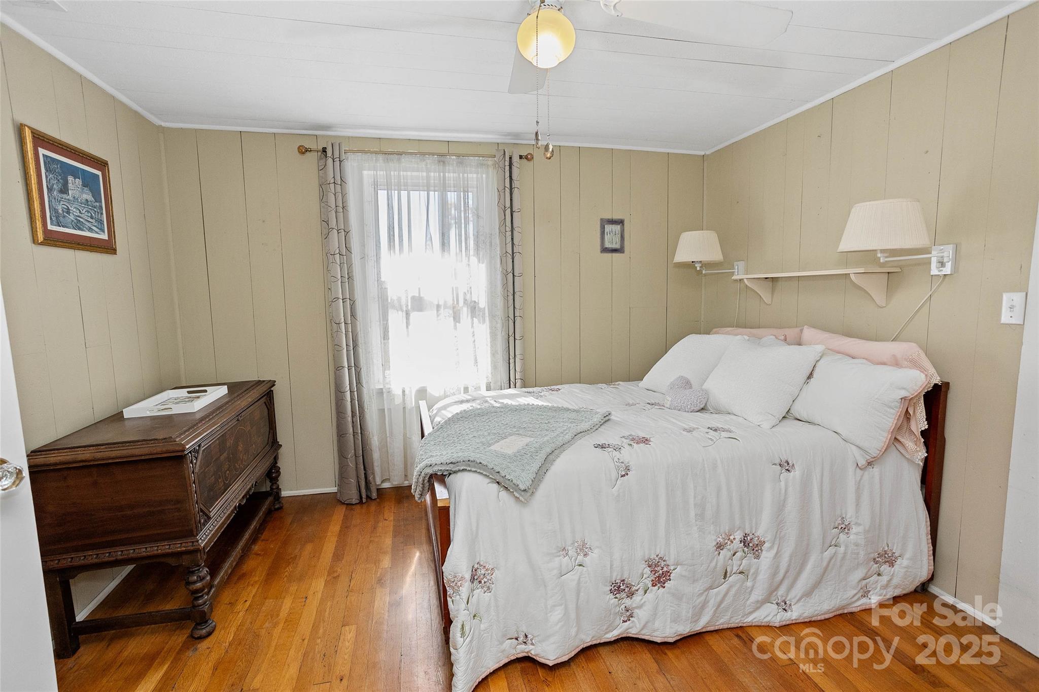 3471 Chimney Rock Road Hendersonville, NC 28792 - Photo 26 of 48 a bedroom with a bed and a desk