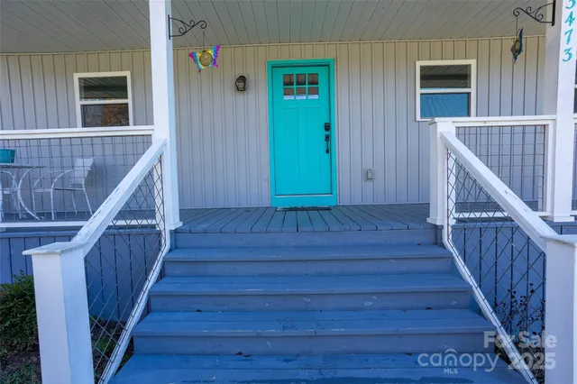 a kitchen with stainless steel appliances a refrigerator and a stove top oven
