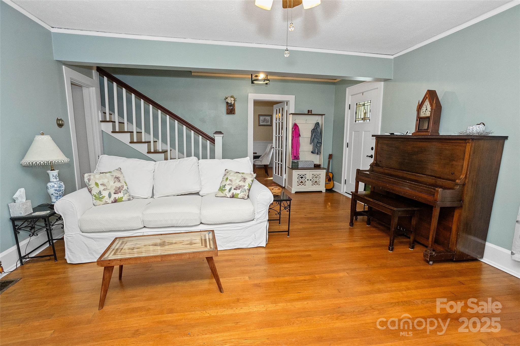 3471 Chimney Rock Road Hendersonville, NC 28792 - Photo 7 of 48 a living room with furniture and a piano