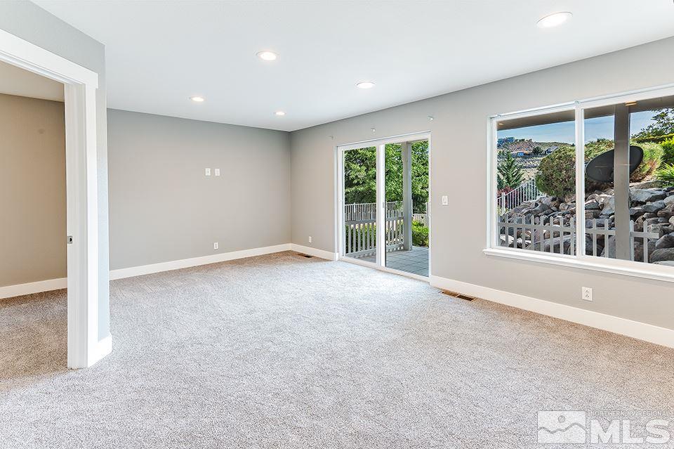 2450 Granite Springs Road Reno, NV 89519 - Photo 11 of 17 a view of an empty room with a window