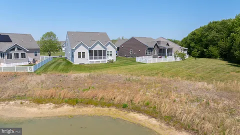 a view of a house with a big yard