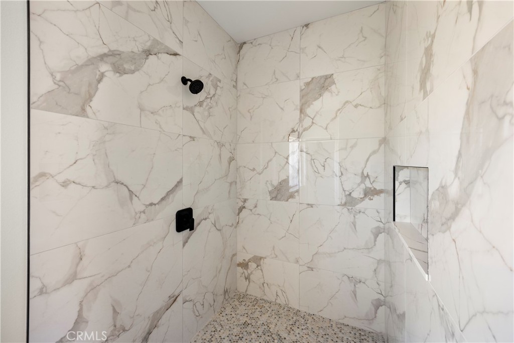 22324 Rancho Street Apple Valley, CA 92308 - Photo 27 of 47 a bathroom with a shower