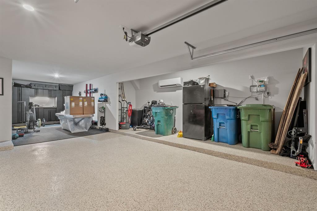 11504 Antler Ridge Way Argyle, TX 76226 - Photo 32 of 40 a view of a garage with furniture