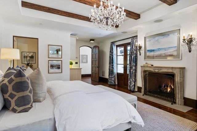 a bathroom with a sink vanity and shower