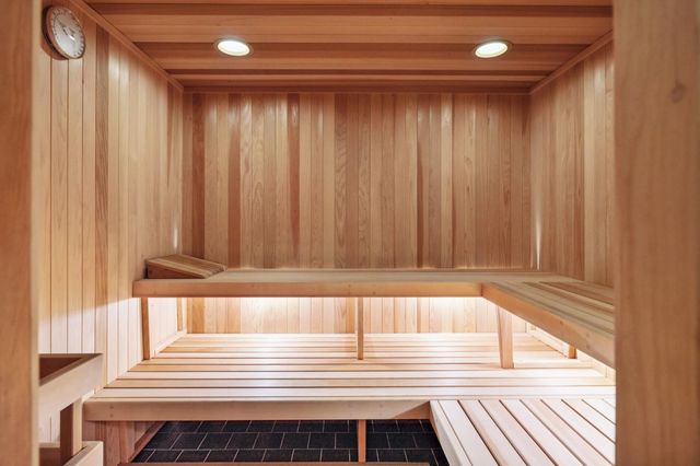 a table and chairs in front of a house