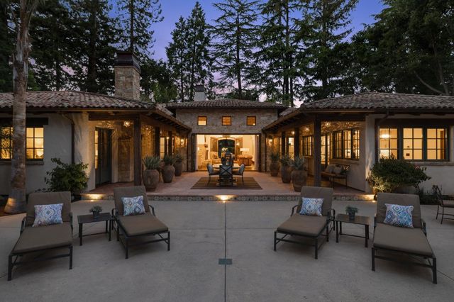 a kitchen with a stove and a sink