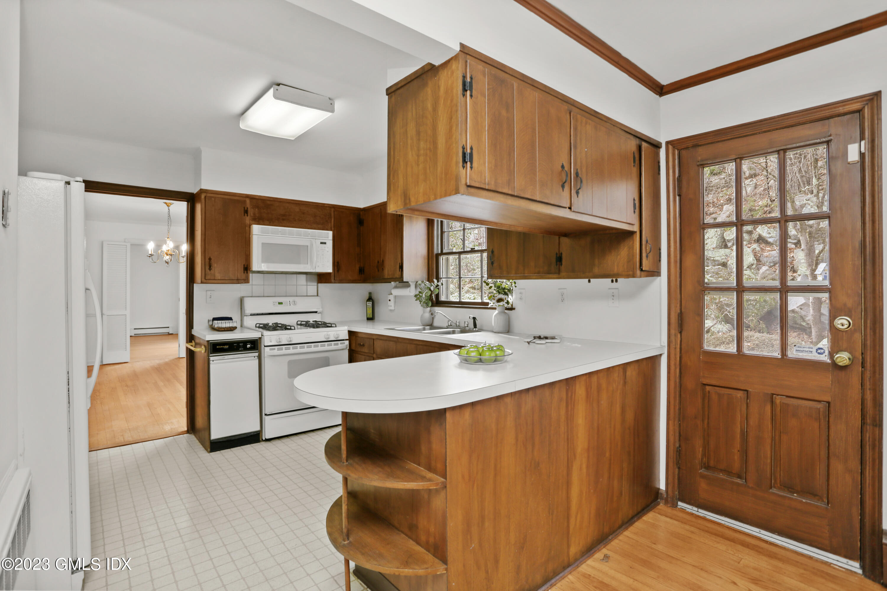 55 Frontier Road Cos Cob, CT 06807 - Photo 21 of 38 a kitchen with stainless steel appliances granite countertop a stove a sink and a refrigerator