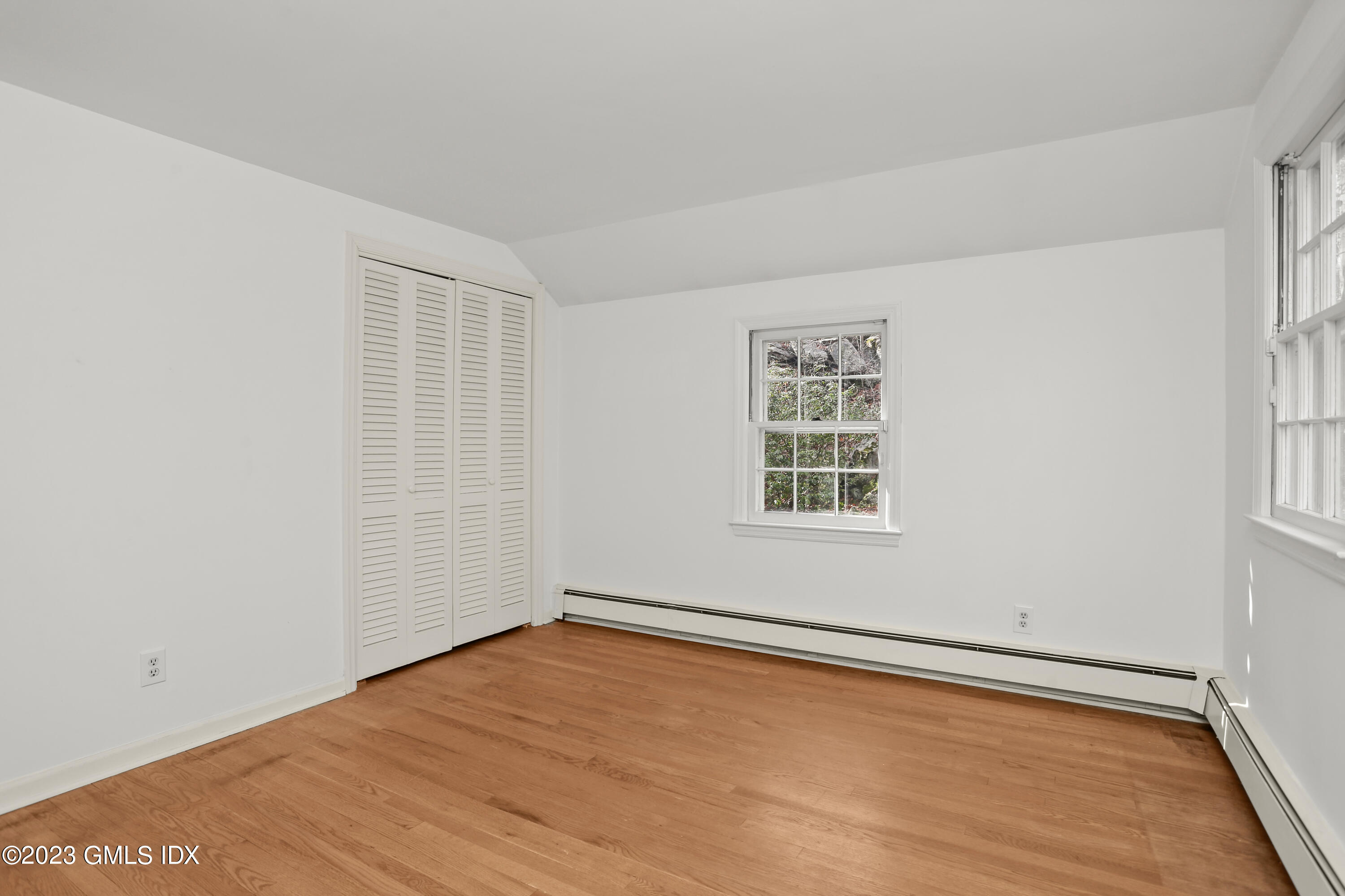 55 Frontier Road Cos Cob, CT 06807 - Photo 28 of 38 an empty room with a window