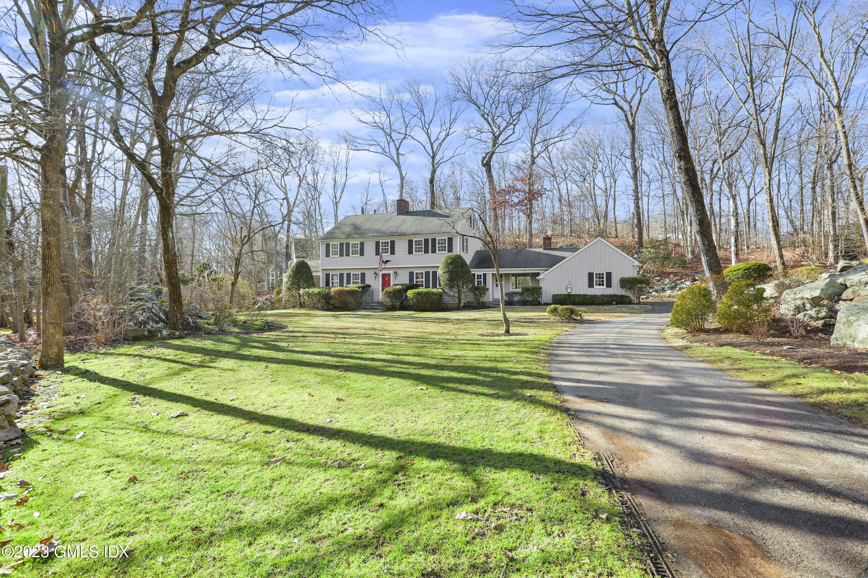 55 Frontier Road Cos Cob, CT 06807 - Photo 3 of 38 a view of swimming pool with outdoor seating and trees