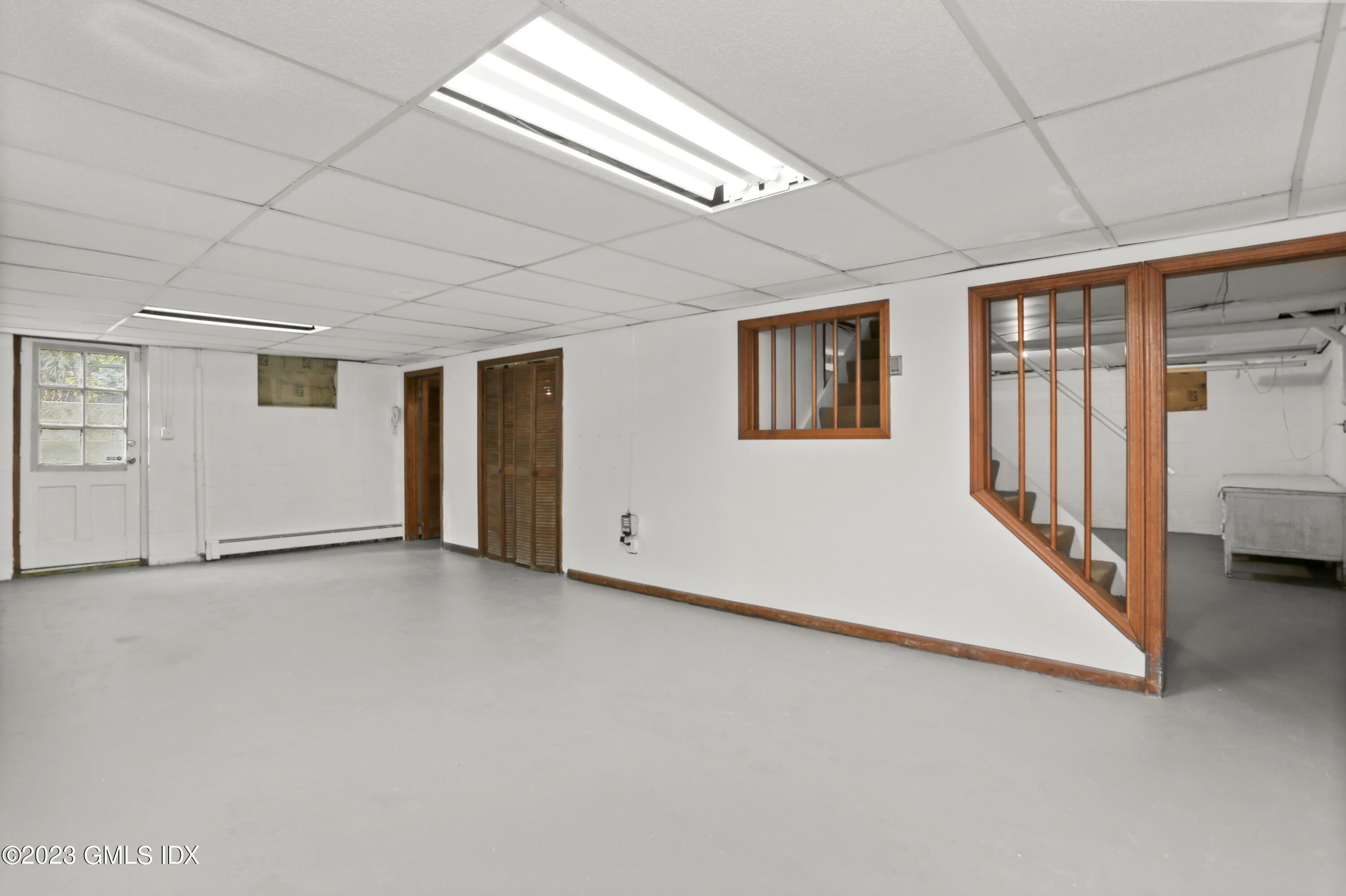 55 Frontier Road Cos Cob, CT 06807 - Photo 32 of 38 an empty room with windows