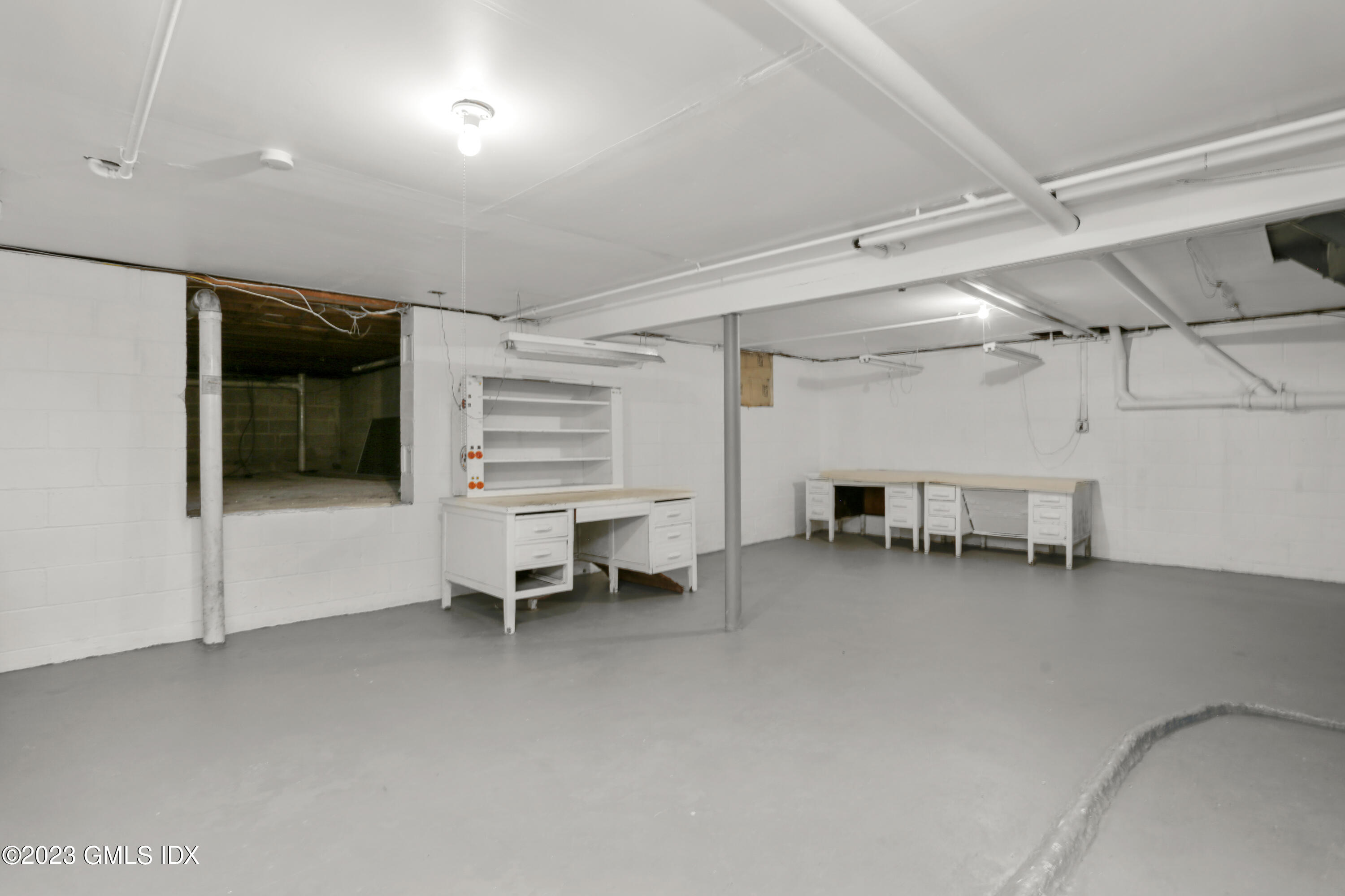 55 Frontier Road Cos Cob, CT 06807 - Photo 33 of 38 a view of a livingroom with entryway and furniture