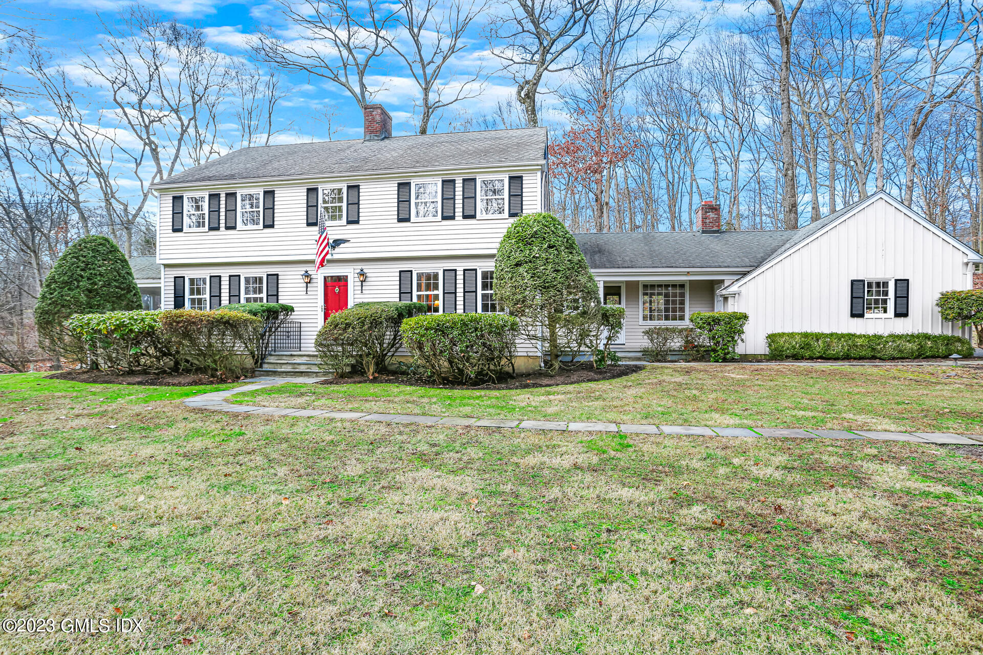 55 Frontier Road Cos Cob, CT 06807 - Photo 35 of 38 a front view of house with yard and green space