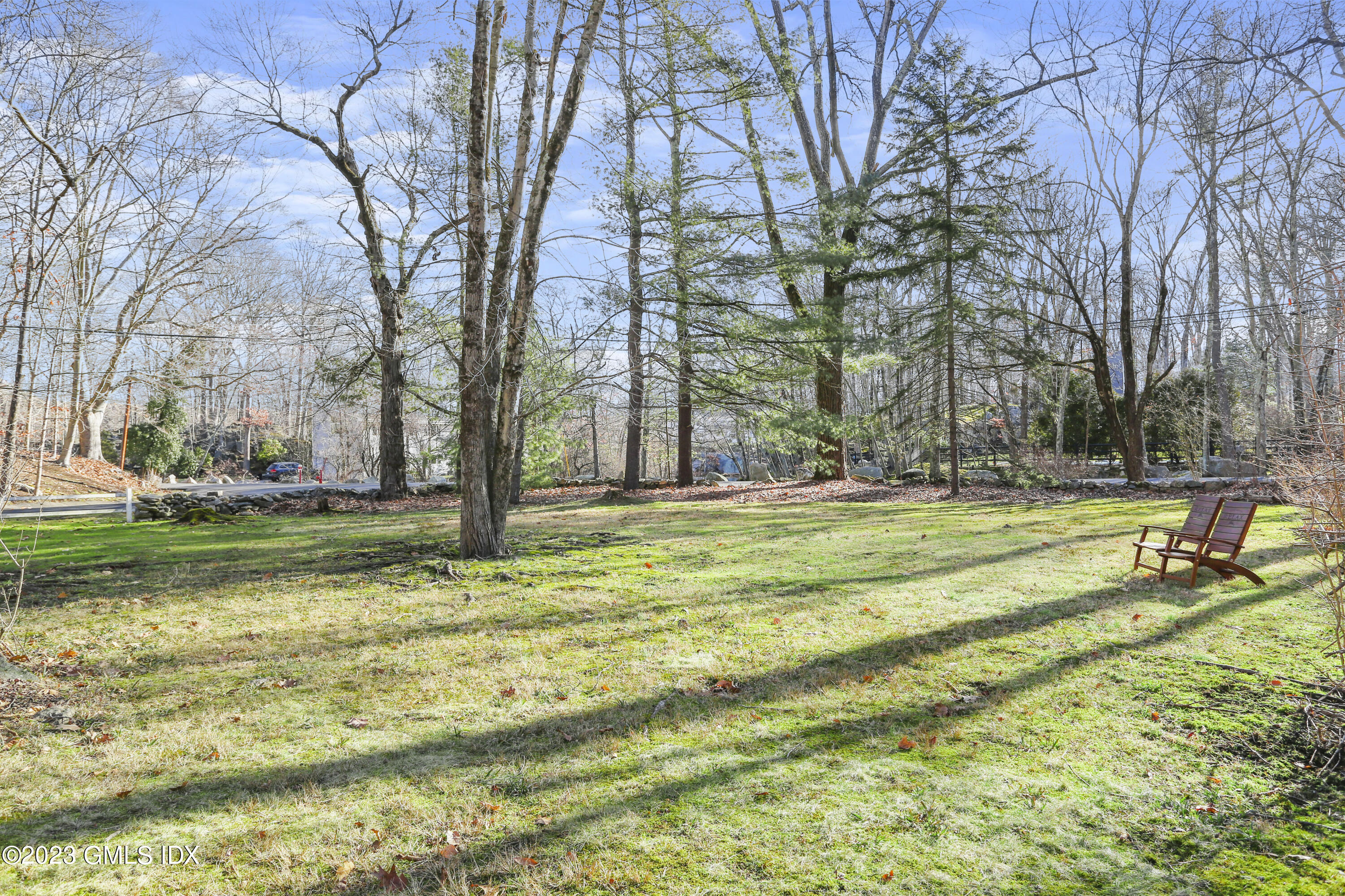 55 Frontier Road Cos Cob, CT 06807 - Photo 4 of 38 a swimming pool with outdoor seating and yard