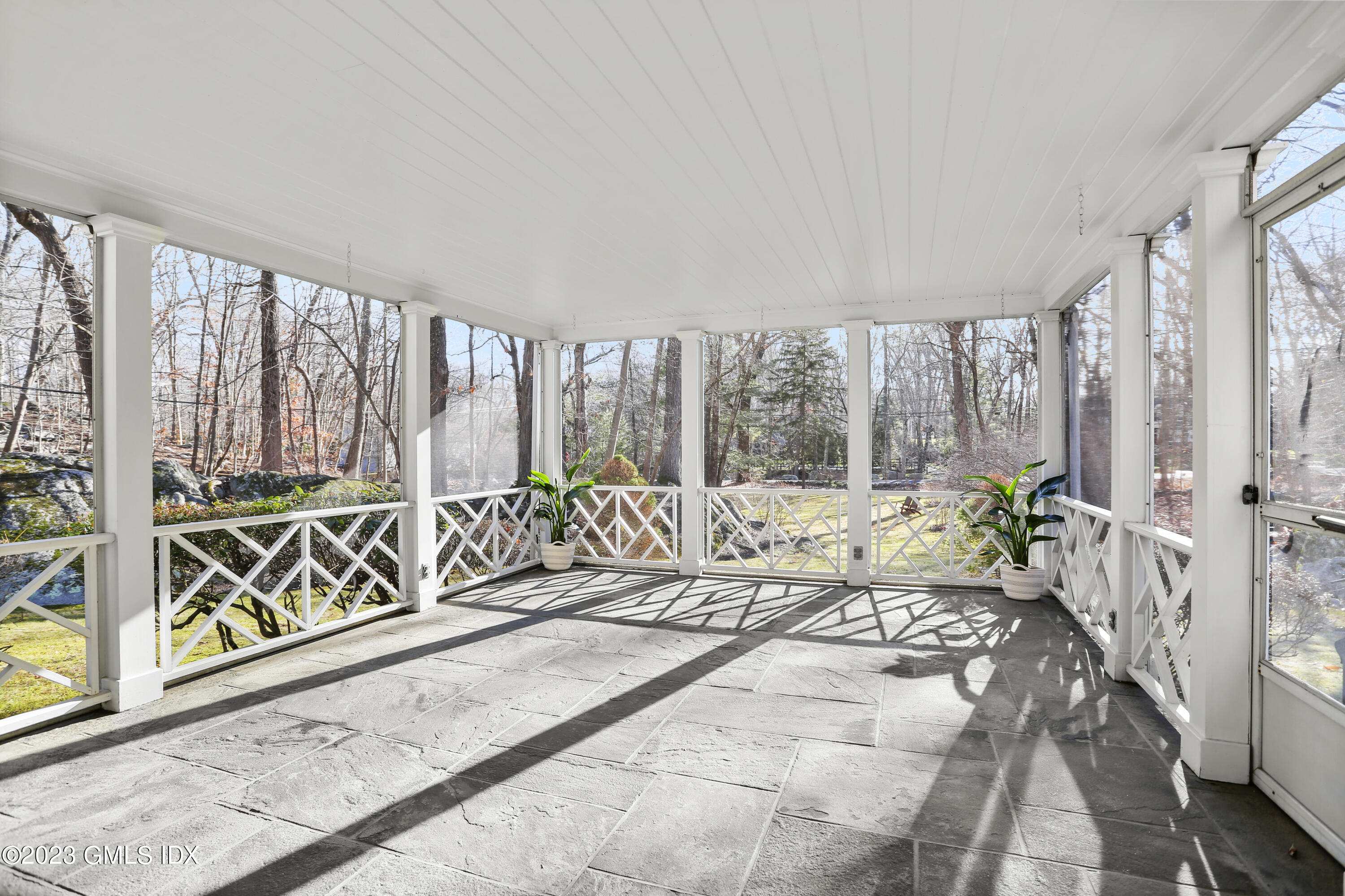 55 Frontier Road Cos Cob, CT 06807 - Photo 6 of 38 a living room with large windows
