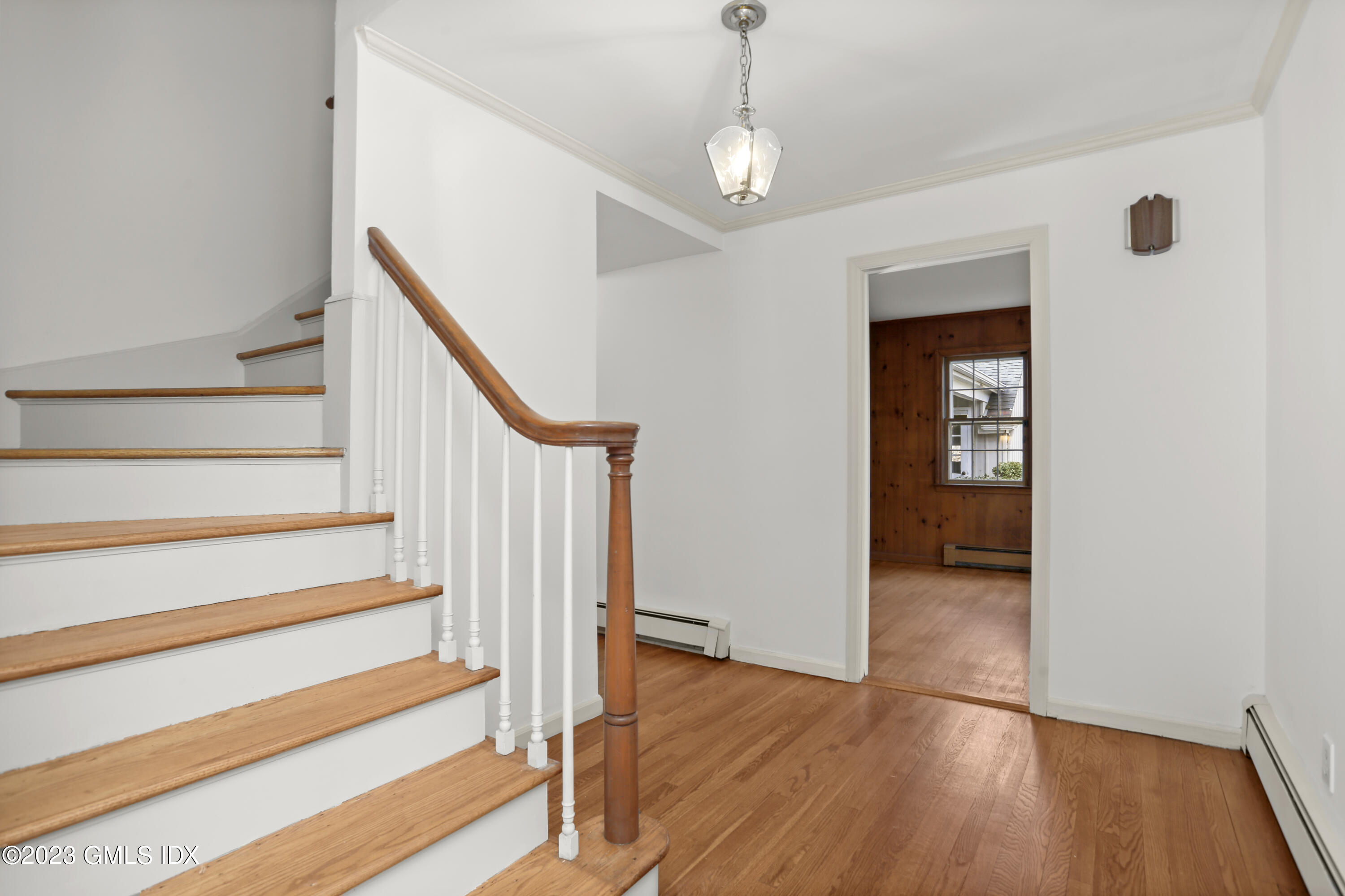 55 Frontier Road Cos Cob, CT 06807 - Photo 9 of 38 a view of entryway with wooden floor