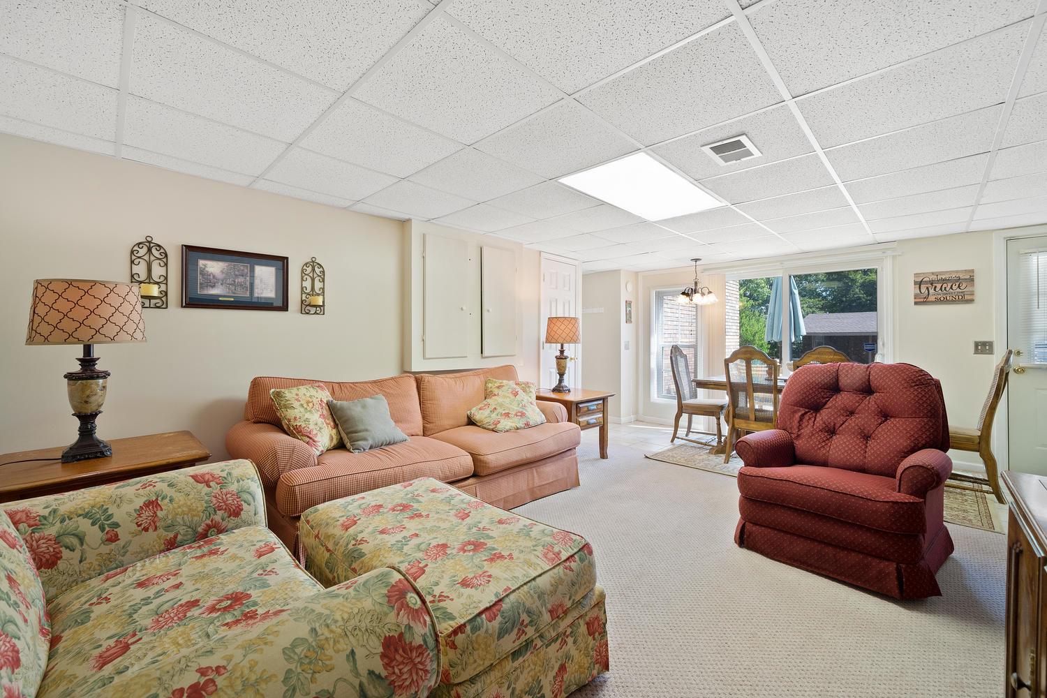 580 7 Mile Ferry Road Cunningham, TN 37052 - Photo 23 of 30 a living room with furniture ceiling fan and a window