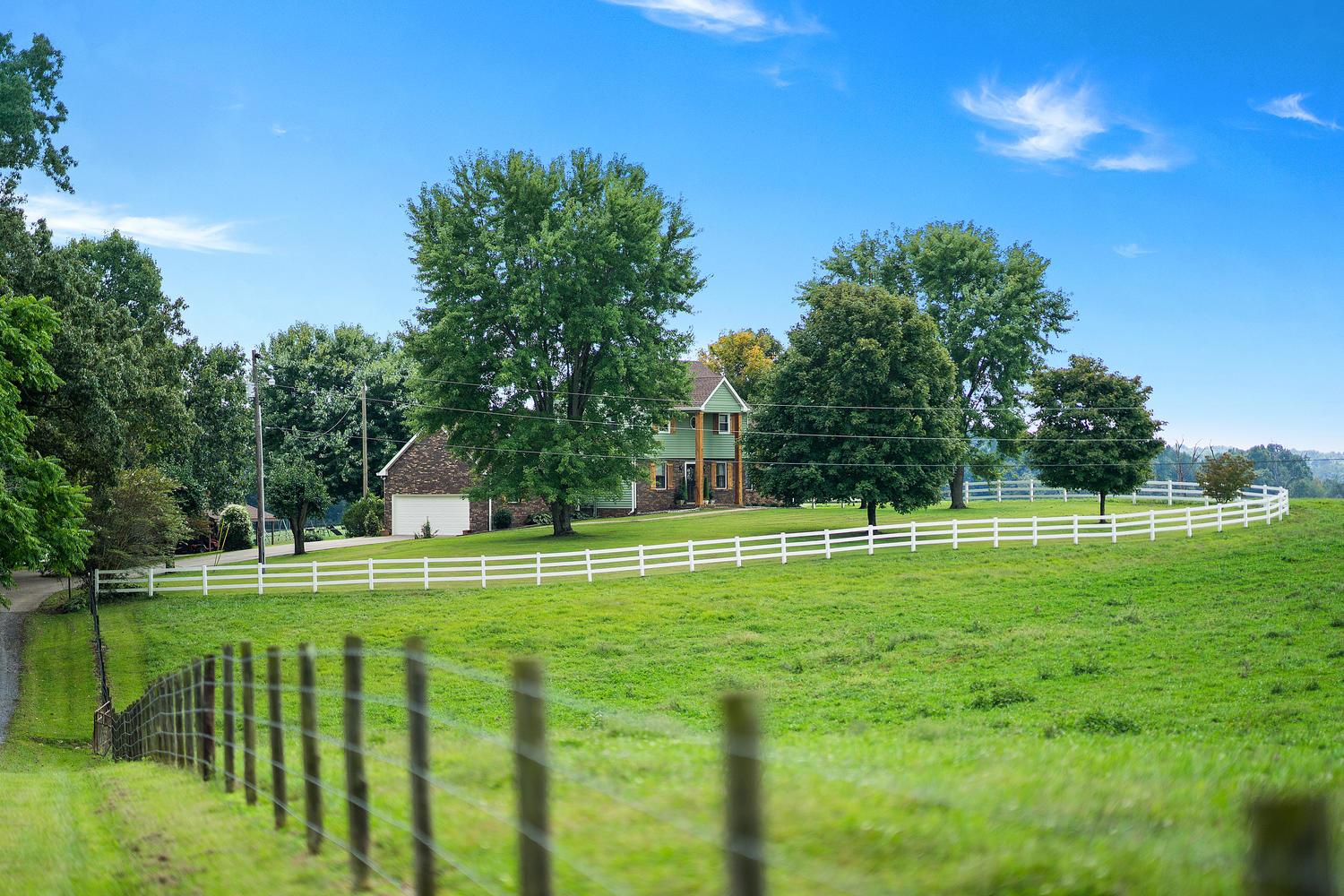 580 7 Mile Ferry Road Cunningham, TN 37052 - Photo 3 of 30 a big yard with lots of green space and deers