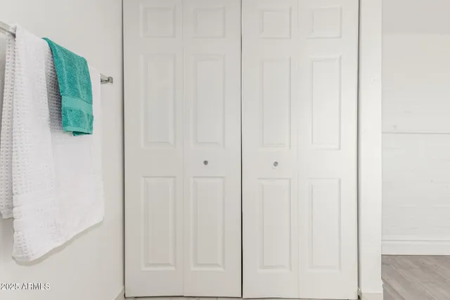 a view of a house with pool and chairs