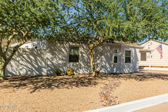 a view of a house with snow on the ground