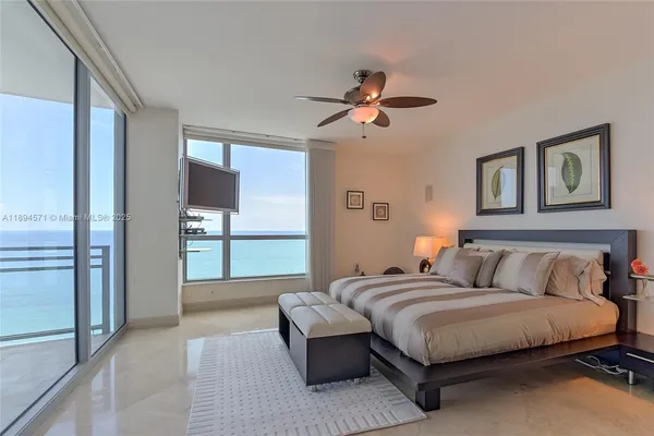 a room with furniture and flat screen tv