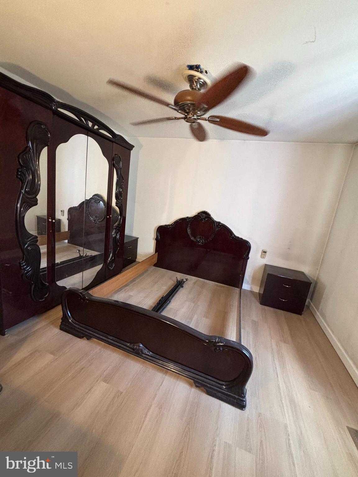 9336 Neil Road, Unit B Philadelphia, PA 19115 - Photo 14 of 37 a bedroom with a bed window and dresser