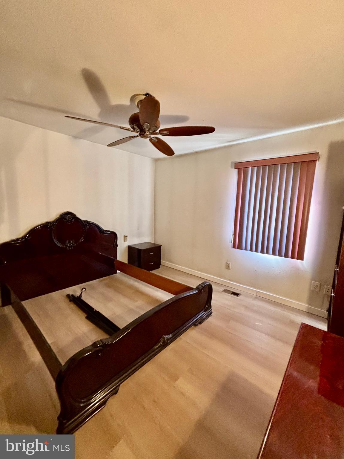 9336 Neil Road, Unit B Philadelphia, PA 19115 - Photo 15 of 37 a bedroom with a bed and a chandelier