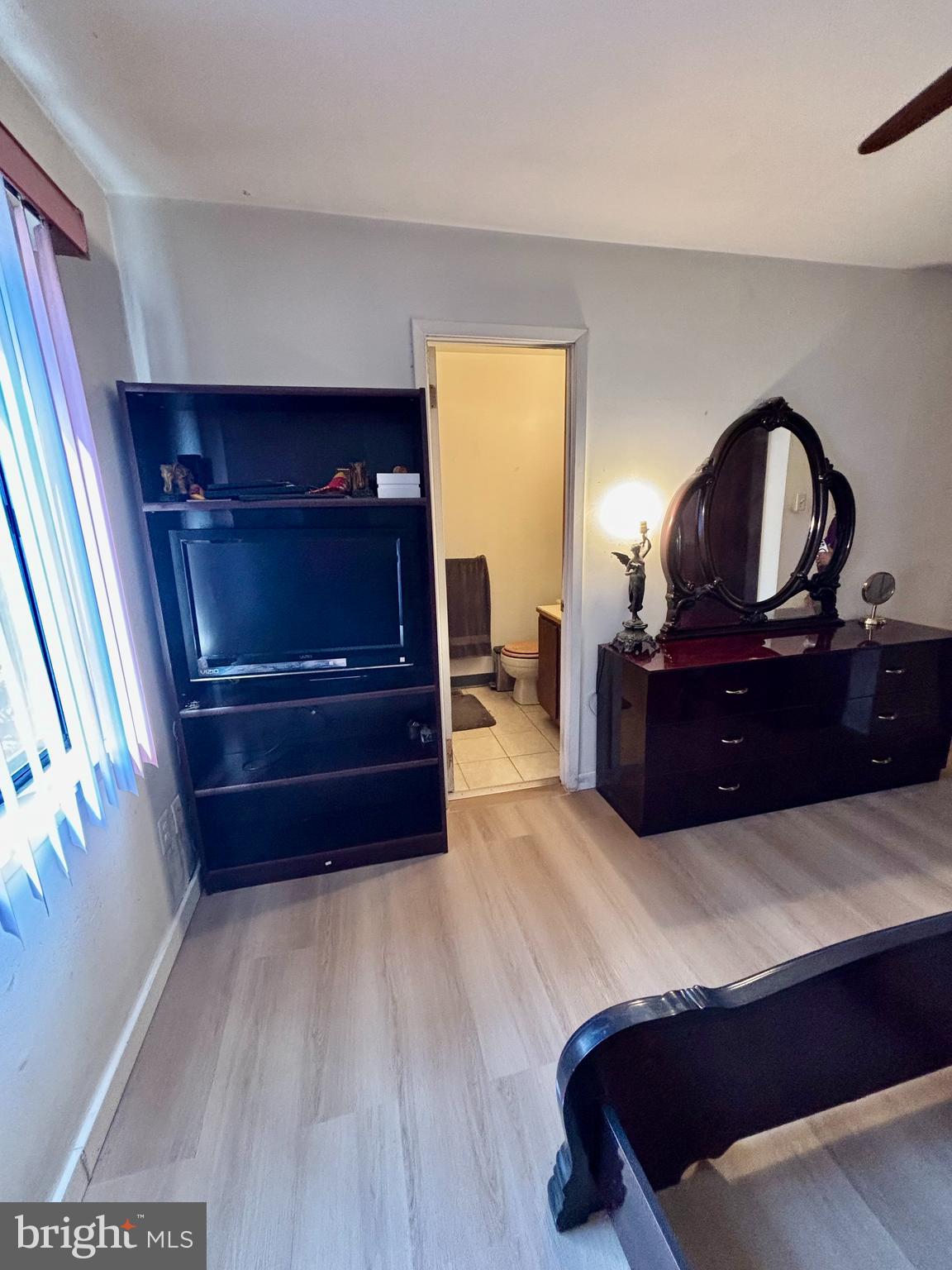 9336 Neil Road, Unit B Philadelphia, PA 19115 - Photo 16 of 37 a bedroom with a bed and a dresser