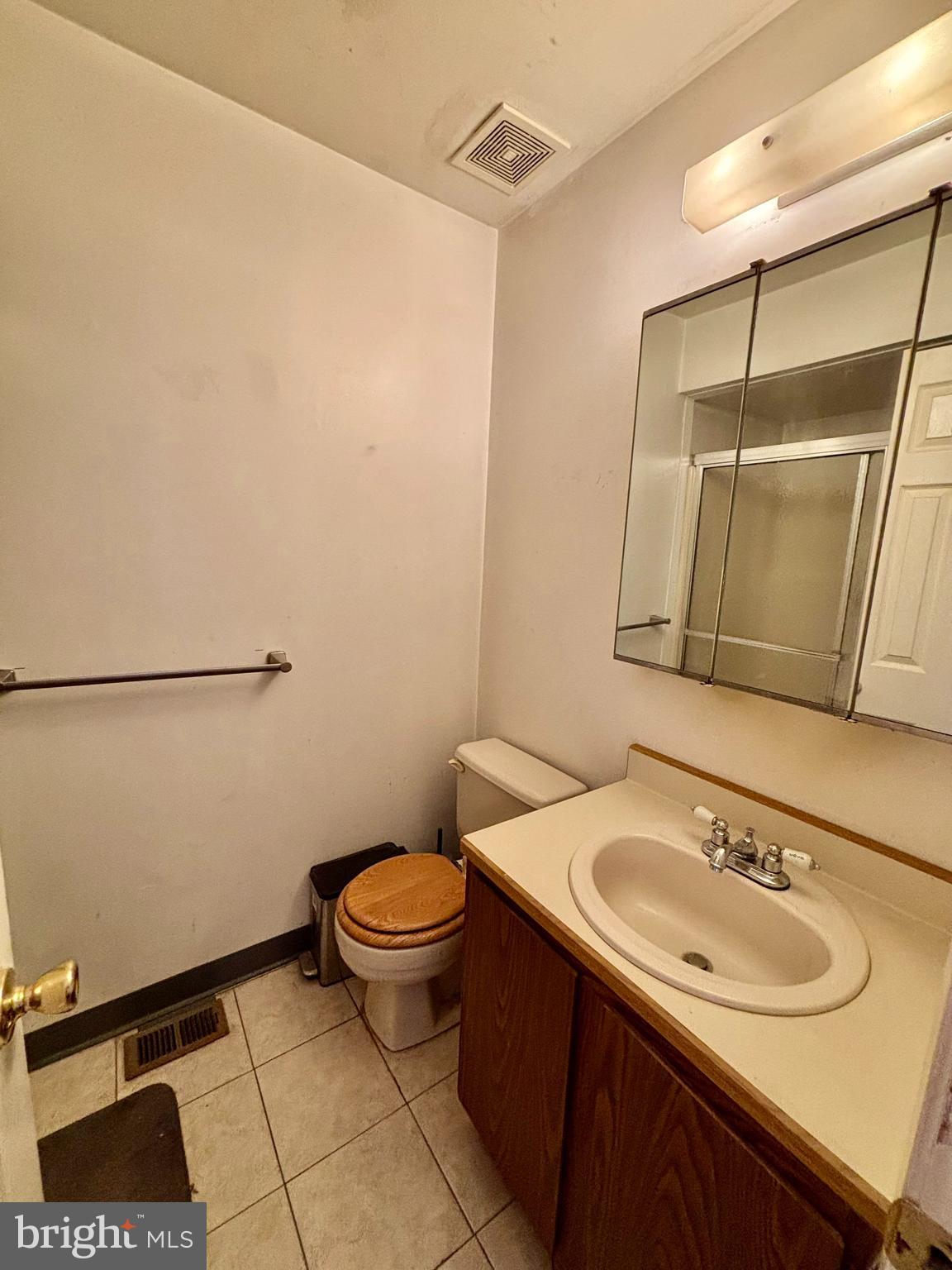 9336 Neil Road, Unit B Philadelphia, PA 19115 - Photo 20 of 37 a bathroom with a sink and a mirror