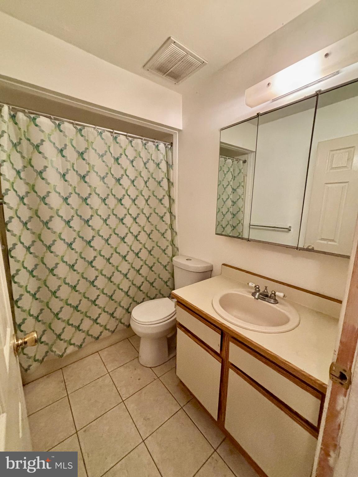 9336 Neil Road, Unit B Philadelphia, PA 19115 - Photo 25 of 37 a bathroom with a sink and a toilet