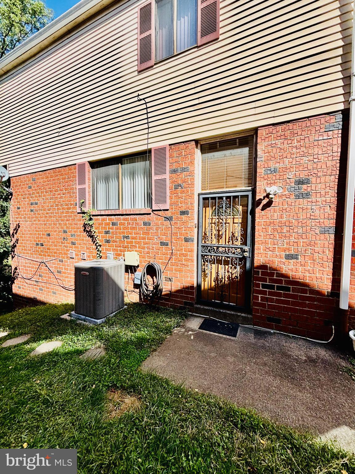 9336 Neil Road, Unit B Philadelphia, PA 19115 - Photo 3 of 37 a front view of a house with garden