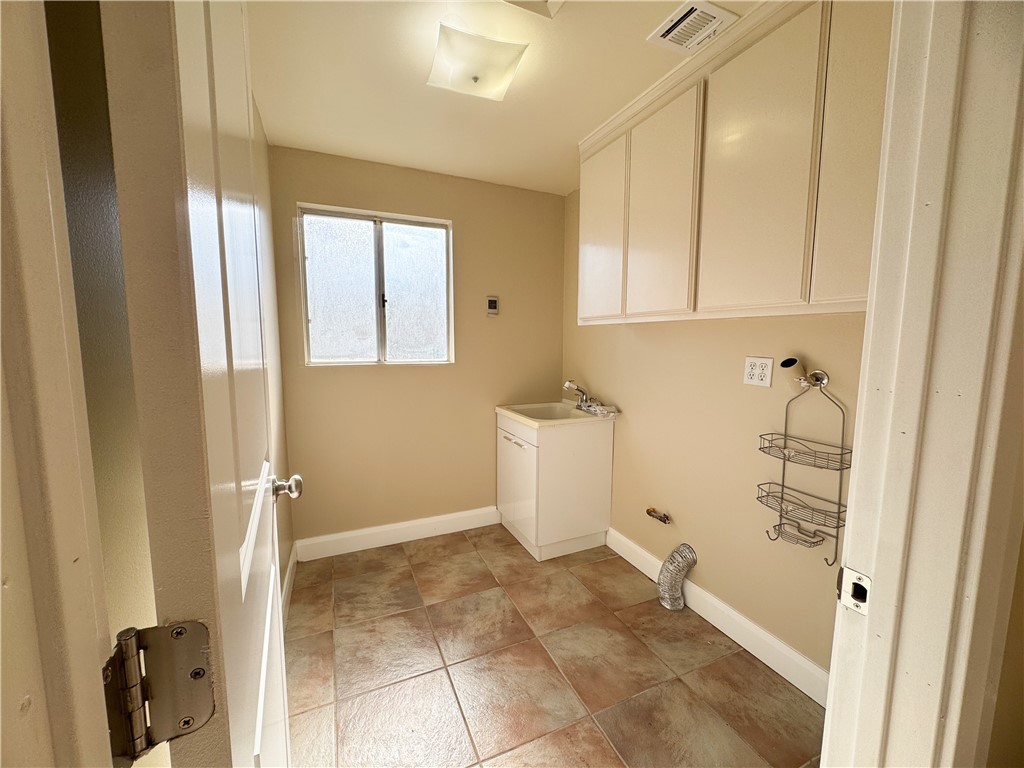 12162 Bradford Place Granada Hills, CA 91344 - Photo 18 of 27 a bathroom with a sink and a shower