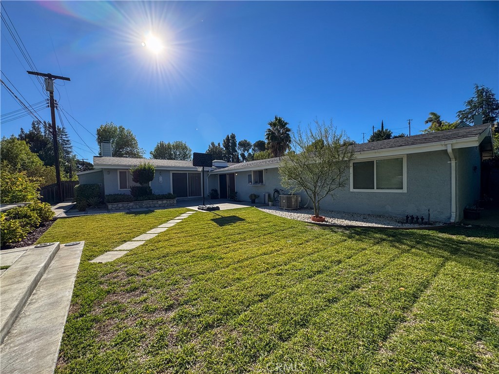 12162 Bradford Place Granada Hills, CA 91344 - Photo 21 of 27 a swimming pool with yard